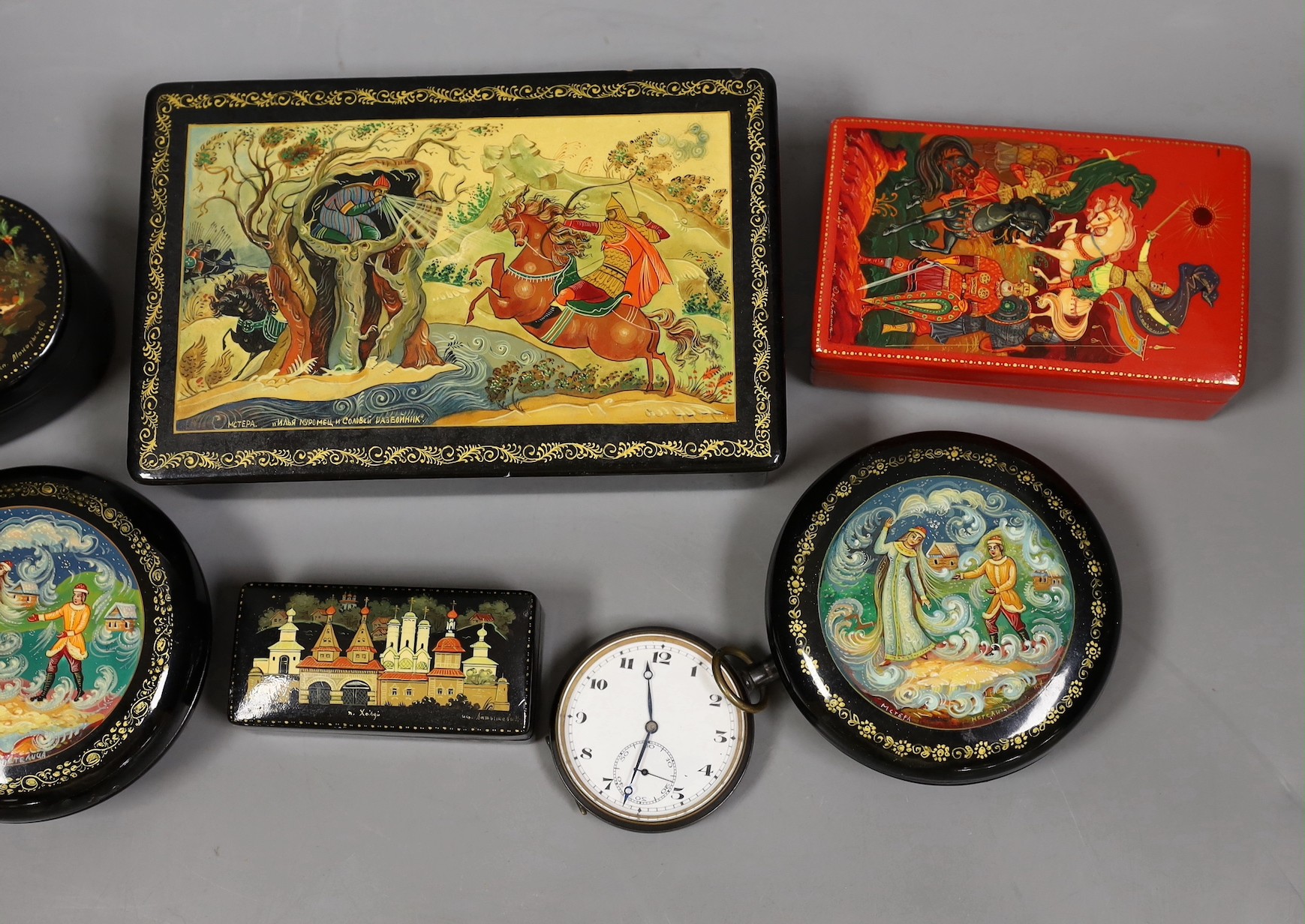 A selection of six Russian papier mache boxes, largest 14.5cm long